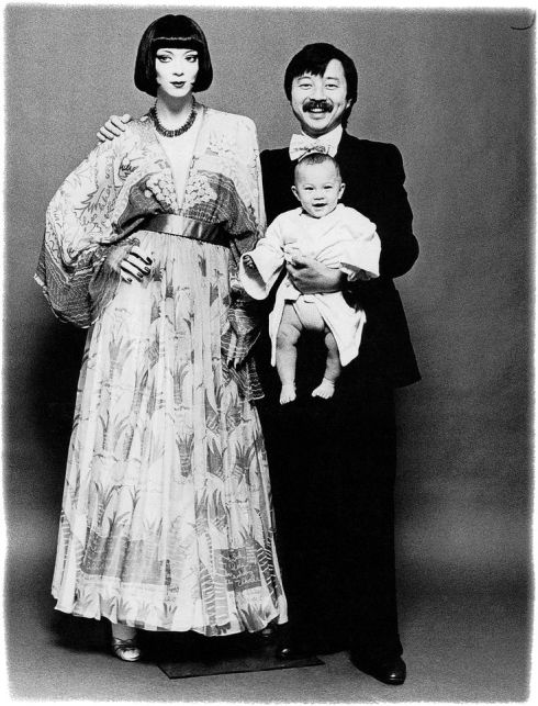 Michael and China Chow with an Adel Rootstein mannequin of Tina Chow in a 1973 printed chiffon evening gown with satin sash by Zandra Rhodes, 1975
