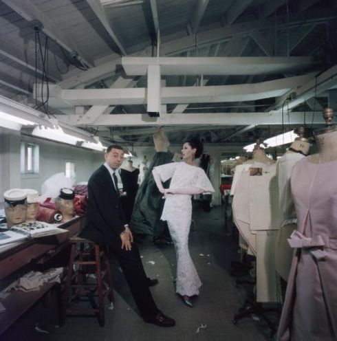 American fashion designer James Galanos with supermodel Dovima in his studio, 1960.