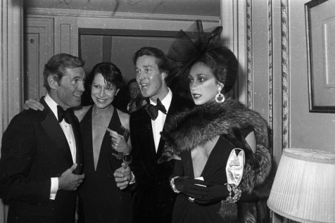 A guest, Elsa Peretti, Halston, and Marisa Berenson celebrate the Battle of Versailles. Photograph by Reginald Gray
